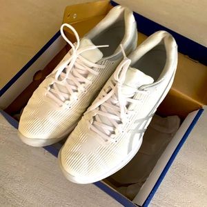 ASICS tennis shoes. Never worn.